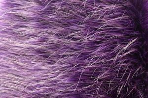 Detailed close up view on samples of cloth and fabrics in different colors found at a fabrics market photo