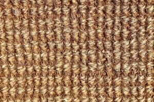 Detailed close up view on samples of cloth and fabrics in different colors found at a fabrics market photo