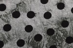 Detailed close up view on samples of cloth and fabrics in different colors found at a fabrics market photo