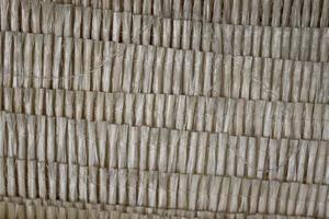 Detailed close up view on samples of cloth and fabrics in different colors found at a fabrics market photo