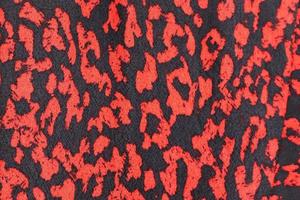 Detailed close up view on samples of cloth and fabrics in different colors found at a fabrics market photo
