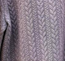 Detailed close up view on samples of cloth and fabrics in different colors found at a fabrics market photo