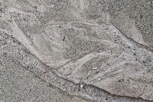 Beautiful shots of the white beach sand on the Seychelles paradise island with footprints photo