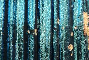Detailed close up view on samples of cloth and fabrics in different colors found at a fabrics market photo