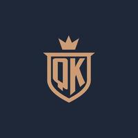 QK monogram initial logo with shield and crown style vector