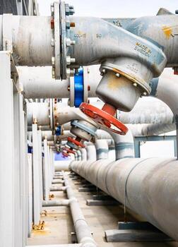 Open or close valve of cooling tower,beside of cooling Tower,screwing valve building cooling system,maintenance in working condition,anti-rust,rust is big problem of piping system. photo