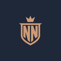 NN monogram initial logo with shield and crown style vector