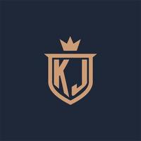 logotipo inicial del monograma kj con estilo escudo y corona vector