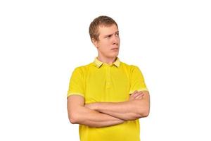 Suspicious man crossed arms on his chest, proud look isolated white background, disappointed emotion photo