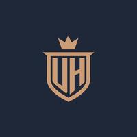 UH monogram initial logo with shield and crown style vector