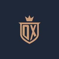 OX monogram initial logo with shield and crown style vector