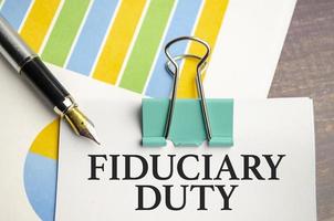 fiduciary duty text on the sticker and charts photo