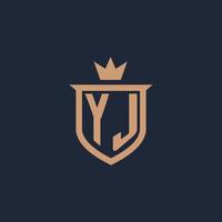 logotipo inicial del monograma yj con estilo de escudo y corona vector