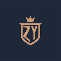 logotipo inicial del monograma zy con estilo de escudo y corona vector