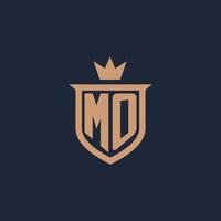 MO monogram initial logo with shield and crown style vector
