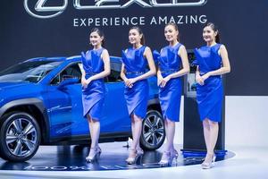 Nonthaburi, Thailand - MAR 27, 2021 Unidentified model poses with a car at The 42th Bangkok International Motor Show Thailand 2021 at IMPACT Arena photo