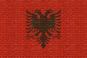 3D Flag of Albania on brick wall photo