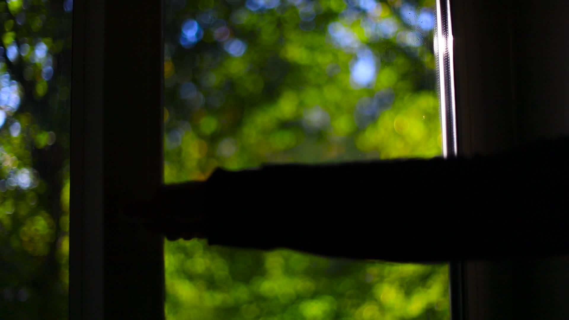 Guy opens window in morning. Open window with your hand. Handle from