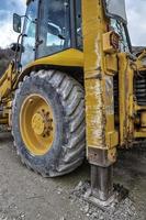 Part of excavator machines Equipment Lock Stabilizer. Vertical view photo