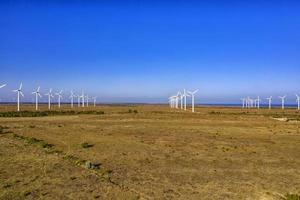 Aerial view at wind turbine farm. Horizontal view photo