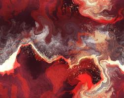 Colorful red marble ink paper textures on dark background. Chaotic abstract organic design. Bath bomb waves. photo