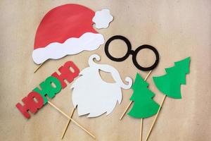 Photo booth colorful props for christmas party - mustache, santa claus, fir tree, glasses, hat