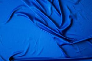 fondo de tela abstracta para banner. textura textil de seda suave en movimiento para papel tapiz
