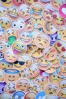 Ternopil, Ukraine - May 8, 2022 Large set of stickers with Emoji yellow faces. Emoji is a pictogram or smiley embedded in text and used in electronic messages and web page photo