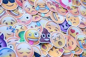 Ternopil, Ukraine - May 8, 2022 Large set of stickers with Emoji yellow faces. Emoji is a pictogram or smiley embedded in text and used in electronic messages and web page photo