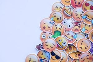 Ternopil, Ukraine - May 8, 2022 Large set of stickers with Emoji yellow faces. Emoji is a pictogram or smiley embedded in text and used in electronic messages and web page photo