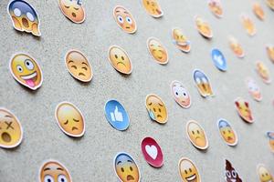 Ternopil, Ukraine - May 8, 2022 Large set of stickers with Emoji yellow faces. Emoji is a pictogram or smiley embedded in text and used in electronic messages and web page photo