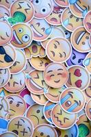 Ternopil, Ukraine - May 8, 2022 Large set of stickers with Emoji yellow faces. Emoji is a pictogram or smiley embedded in text and used in electronic messages and web page photo