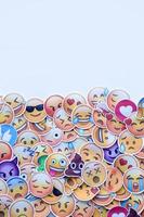 Ternopil, Ukraine - May 8, 2022 Large set of stickers with Emoji yellow faces. Emoji is a pictogram or smiley embedded in text and used in electronic messages and web page photo