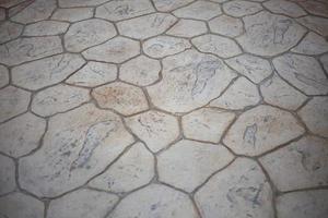 Tiles of different shapes on road. Tiles are laid on floor. Interior details. photo