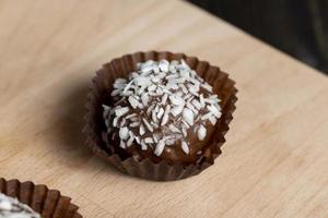 Chocolates with coconut sweet filling photo