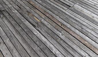 Wooden part of a walking road near the lake photo