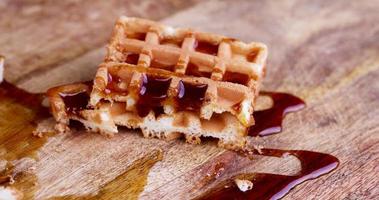 bee honey drips from the soft wiley during dessert cooking photo