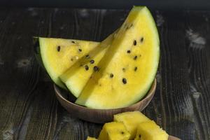 slices of sweet yellow watermelon photo