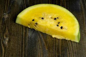 slices of sweet yellow watermelon photo