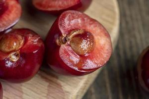 Sweet fresh cherries with other products photo