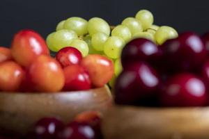 Sweet fresh cherries with other products photo