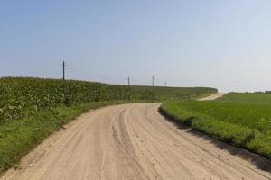 Rural road for cars and transport photo