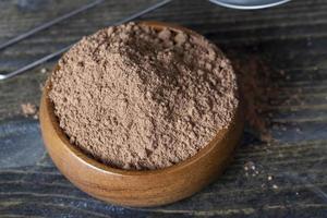 crumbly powder from cocoa beans photo