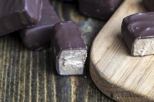 Cocoa and sugar chocolates, close up photo