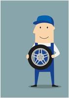 Happy car mechanic with wheel vector