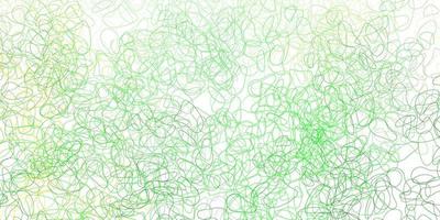 Light green, yellow vector backdrop with chaotic shapes.