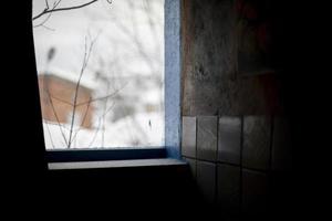 Light from window. View from old window. photo