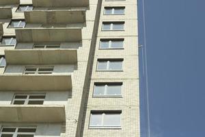 Windows in new house. Construction of residential complex. Building is made of concrete. Architecture details. photo