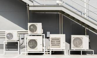 Compressors air conditioners on rooftop building photo
