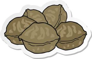 sticker of a cartoon walnuts vector